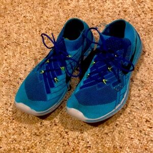 Nike Flyknit Free Runs Women’s size 9 or Mens size 7.5 Nike